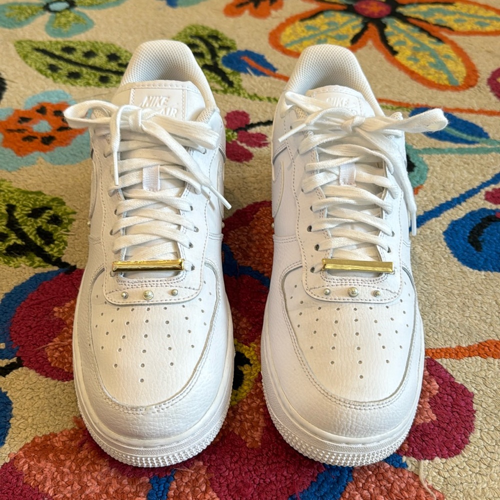 Nike Air Force 1 ‘07 SE, white with pearl studs and gold bar. Size 12 women’s
